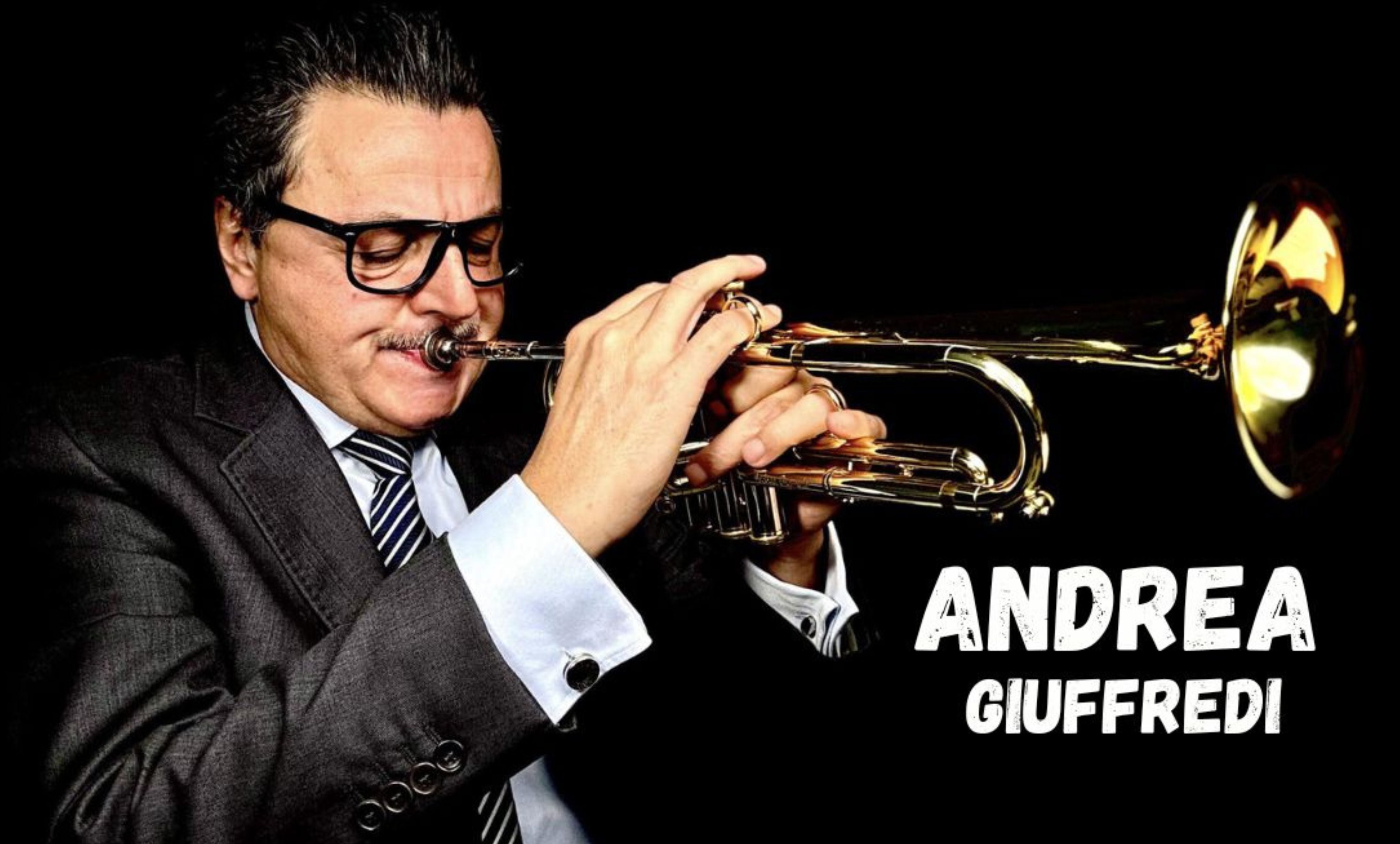 Italian trumpeter Andrea Giuffredi holding a trumpet during a performance