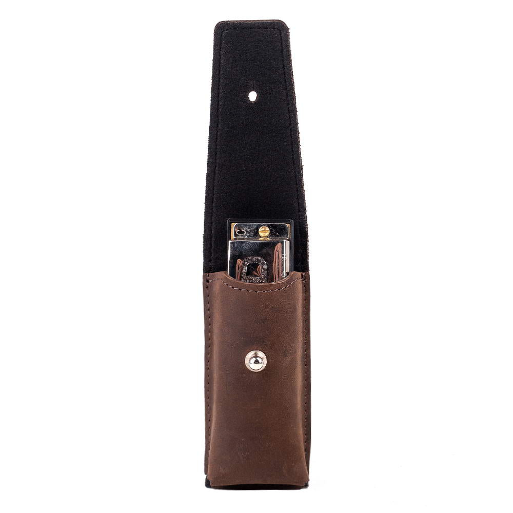 Brown leather harmonica pouch holding harmonica, holster clasp closure for safe transport