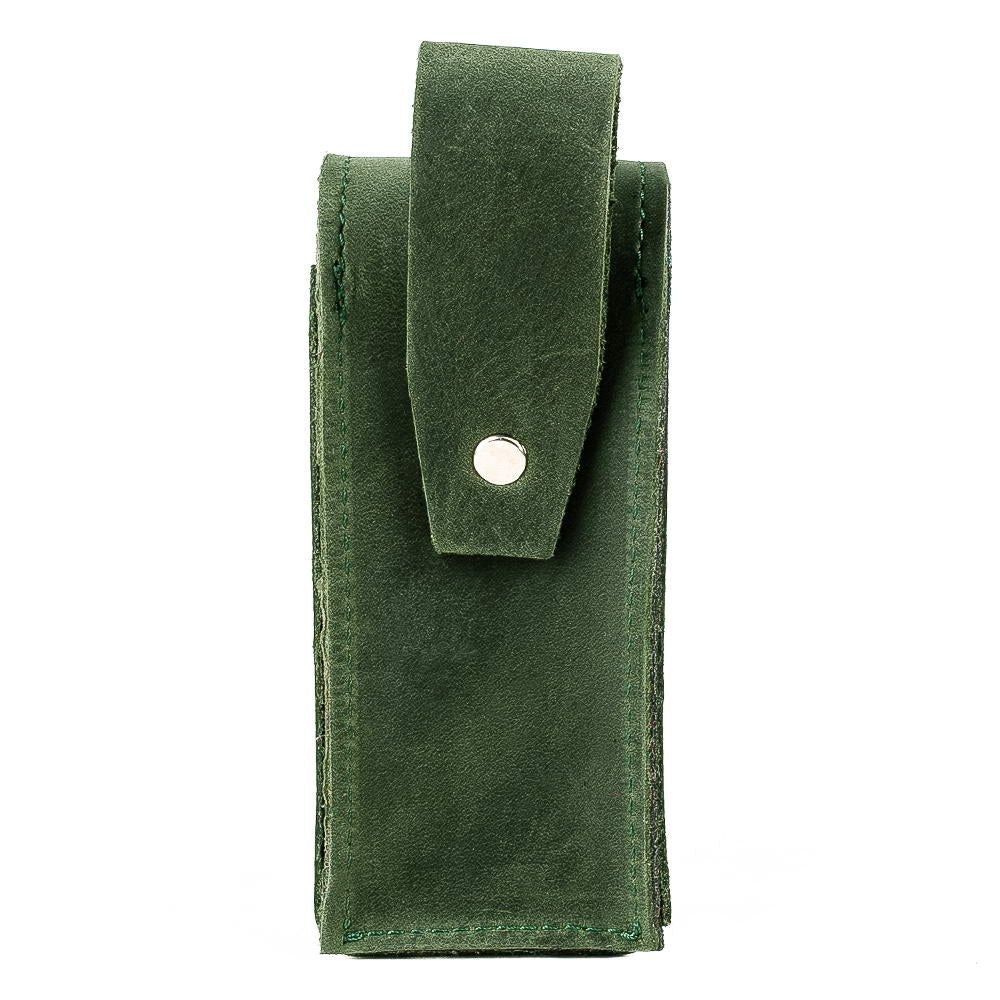 Back view of green harmonica leather case showing closed belt loop flap