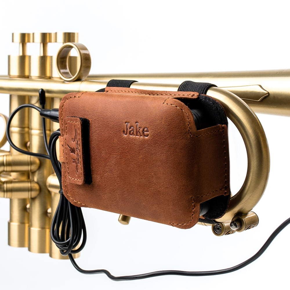 Front view of a personalized leather microphone pouch with the name “Jake.”