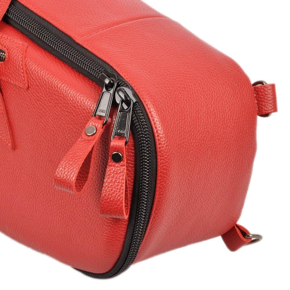 Side view of Alto Sax Case in Red Flotar Leather, showing YKK zippers, zipper pulls, and two D-ring attachments on the back.