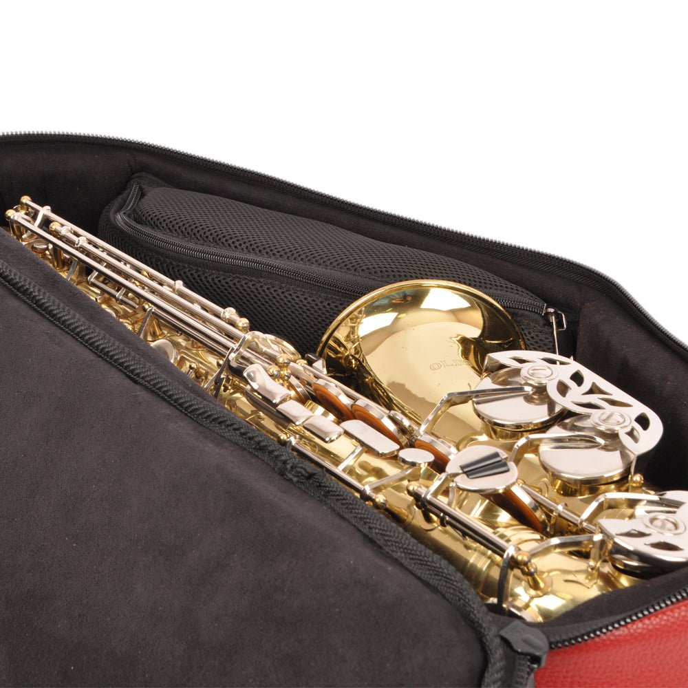 Open view of the Alto Sax Case in Red Flotar Leather, revealing a spacious saxophone compartment with internal pocket for neck and mouthpiece.