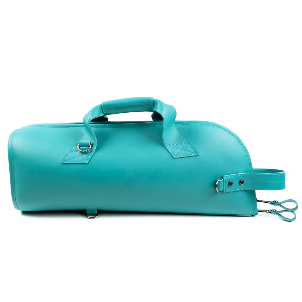 Full side profile of Tiffany blue trumpet case in Crazy Horse leather with strong stitching and reinforced structure