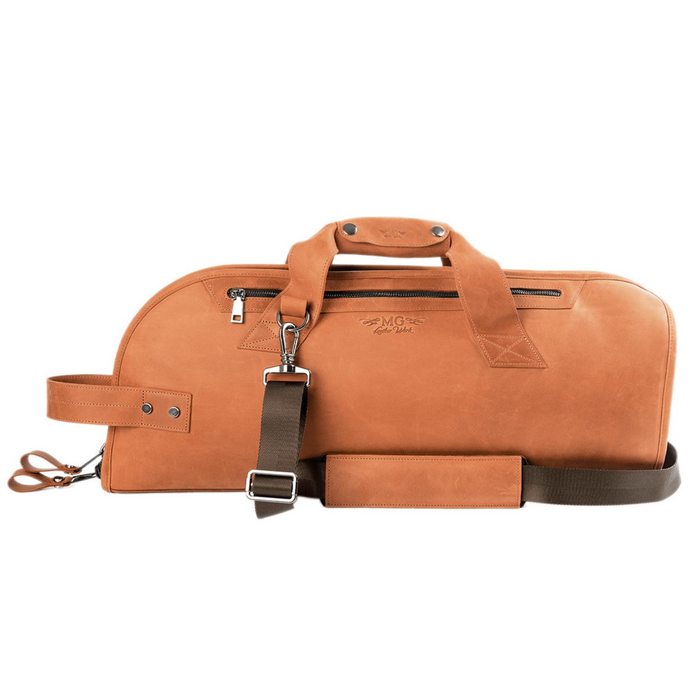 Trumpet gig bag made from light brown Crazy Horse leather, front view showing shoulder strap, top handles, and side pocket with YKK zipper.