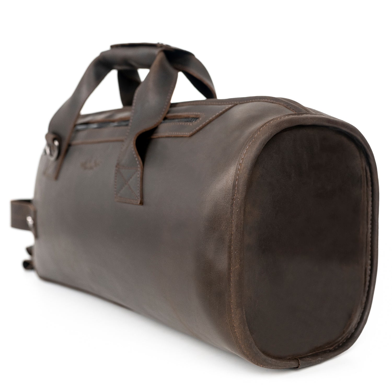 Trumpet case Crazy Horse leather brown – close-up of reinforced bottom side with sturdy construction and vertical carrying handles visible.