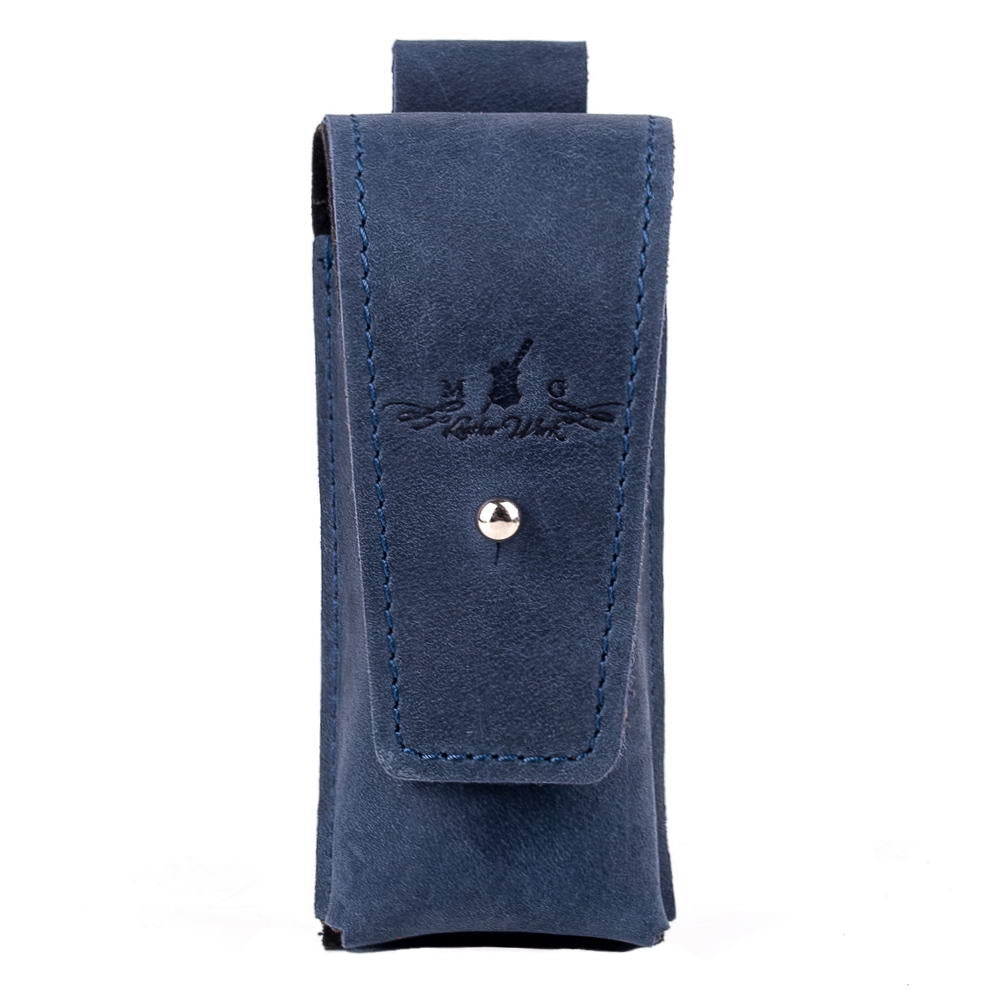 Front view of dark blue leather harmonica case with holster clasp, musician’s handmade gear
