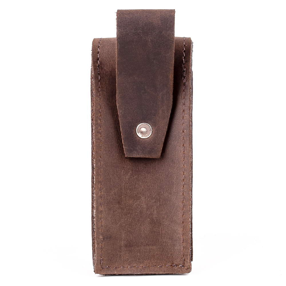 Rear view of brown harmonica leather pouch with secure holster clasp for belt attachment