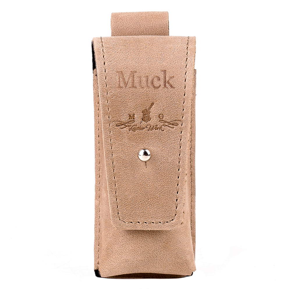 Front view of sand-colored Crazy Horse leather harmonica holster with snap button closure and “Muck” personalization above the logo.