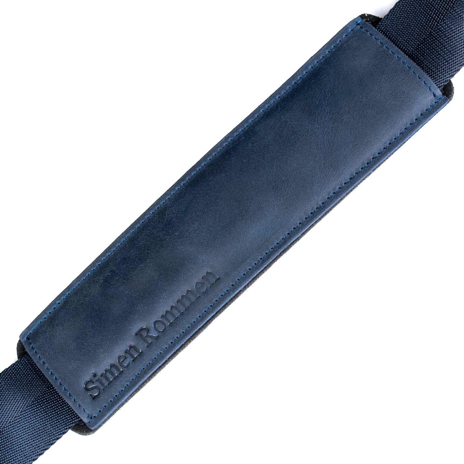 Close-up of the shoulder strap section on the MG Leather Work Alto Saxophone Gig Bag in Dark Blue Crazy Horse leather, featuring custom embossing for a personal touch.