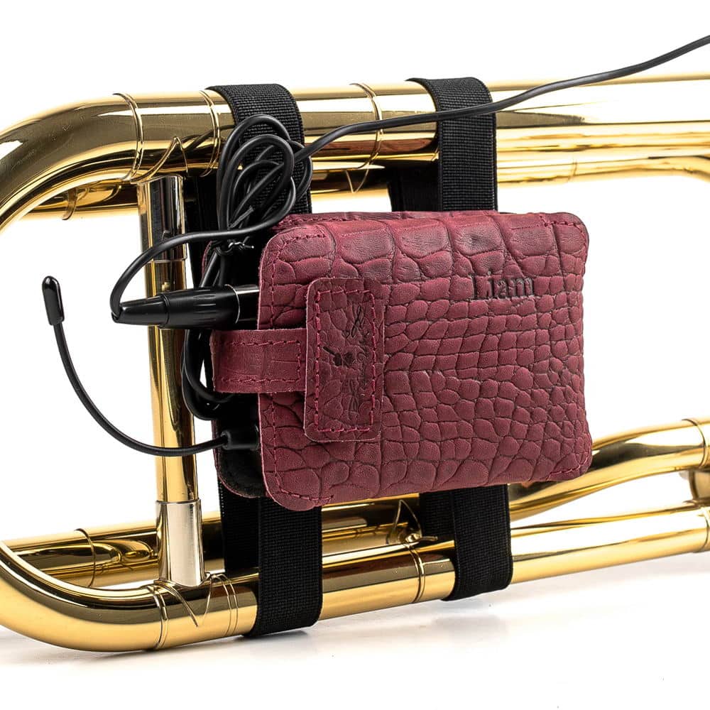 Trombone wireless microphone transmitter pouch in marsala reptile leather — personalized with embossed initials, front view