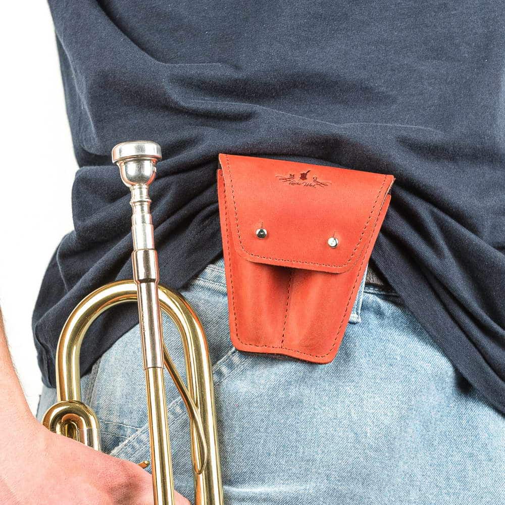 Trumpet double mouthpiece case in red Crazy Horse leather — attached to musician’s belt