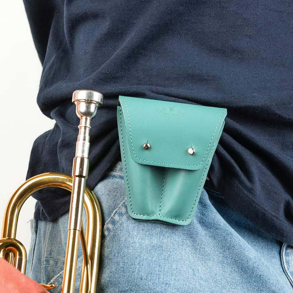 Trumpet double mouthpiece case in Tiffany Crazy Horse leather — attached to musician’s belt