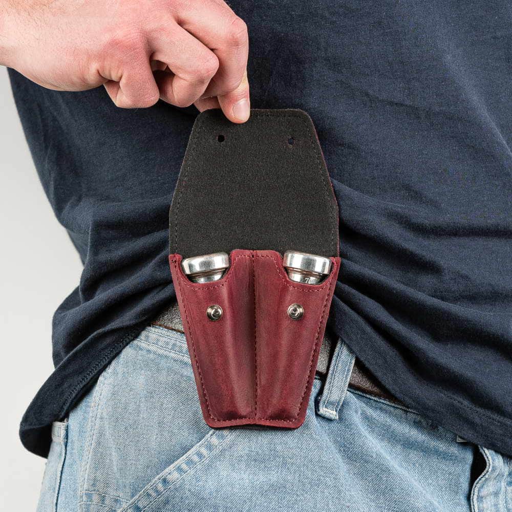 Trumpet double mouthpiece pouch in marsala Crazy Horse leather — open on musician’s belt