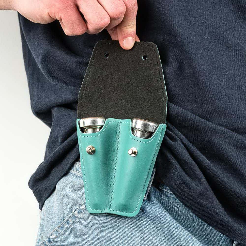 Trumpet double mouthpiece pouch in Tiffany Crazy Horse leather — open on musician’s belt