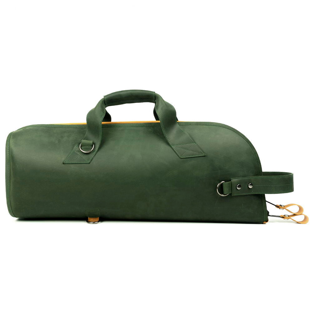 Back view of green leather panel on yellow and green trumpet case with reinforced handles.