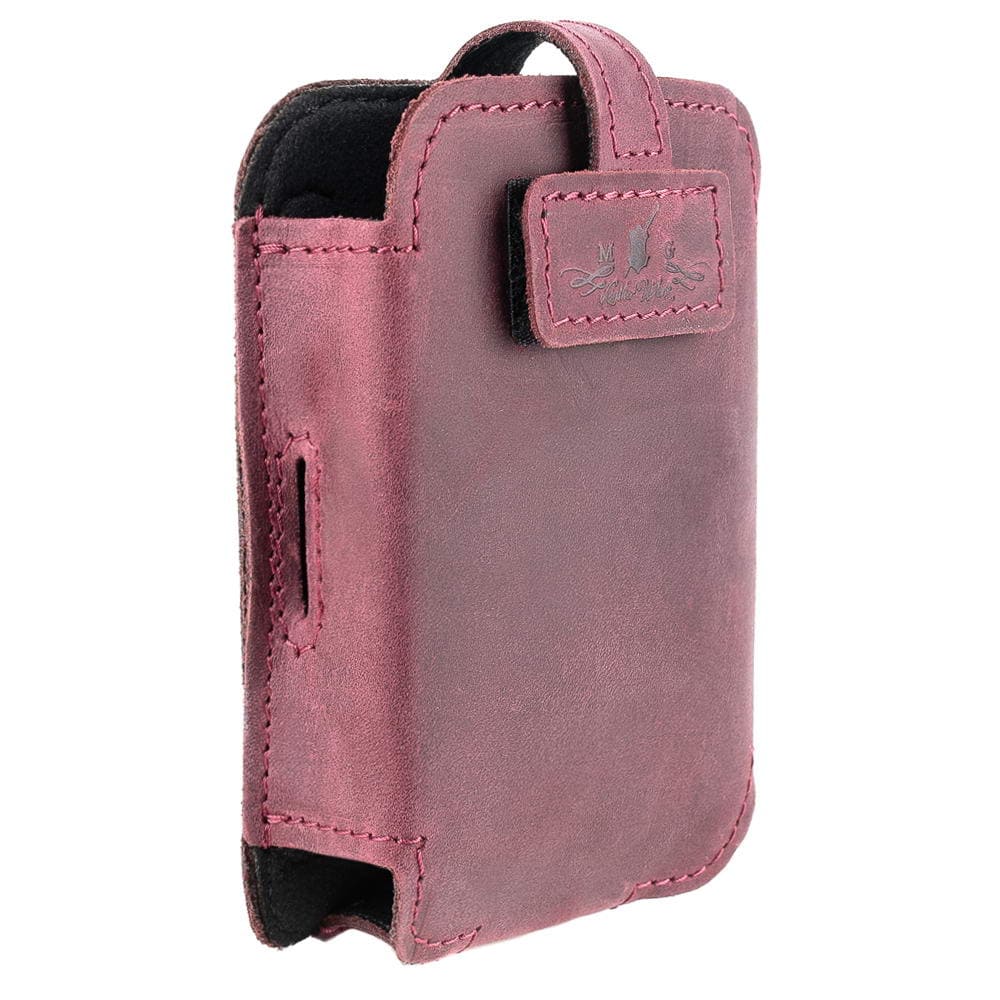 Close-up of a maroon leather case with a metal object inside on a white background