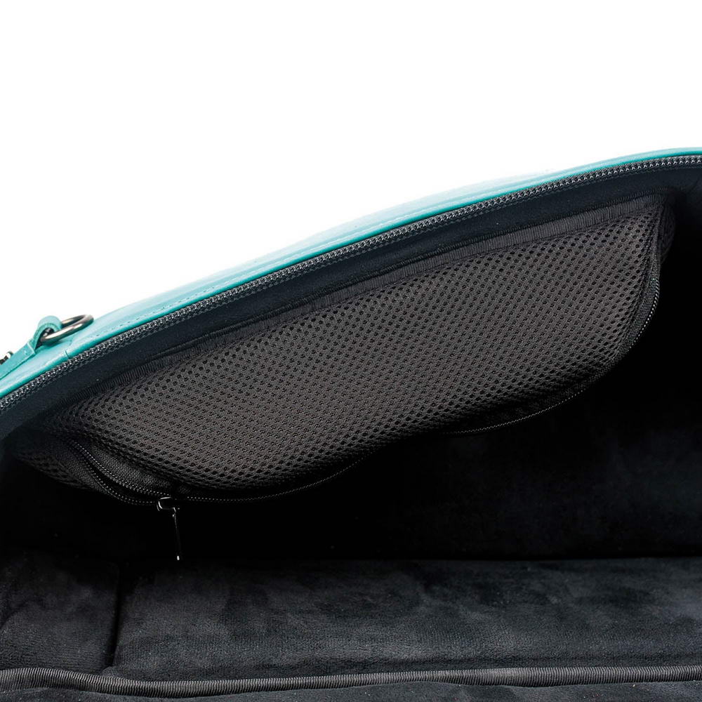 Close-up of the internal pocket in the Alto Saxophone Gig Bag in Tiffany Crazy Horse leather, holding neck and mouthpiece. 