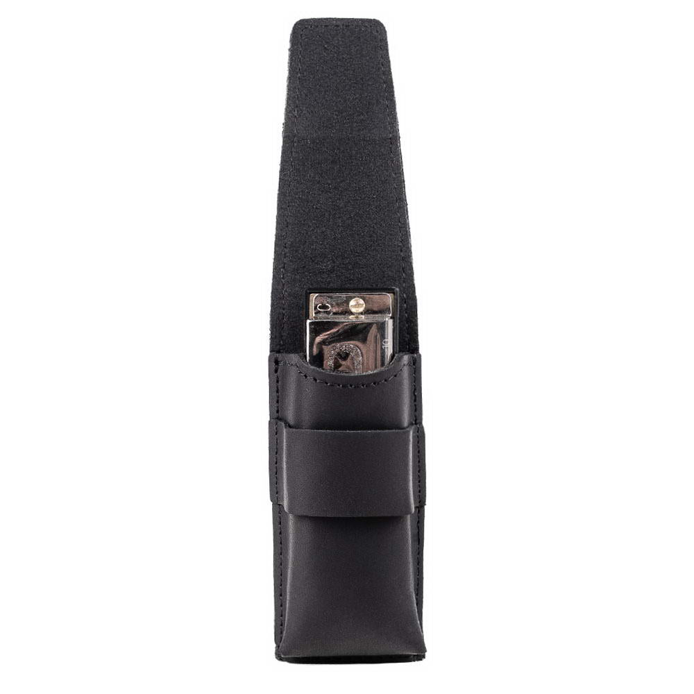Black leather harmonica case holding instrument, flap lifted to show interior.