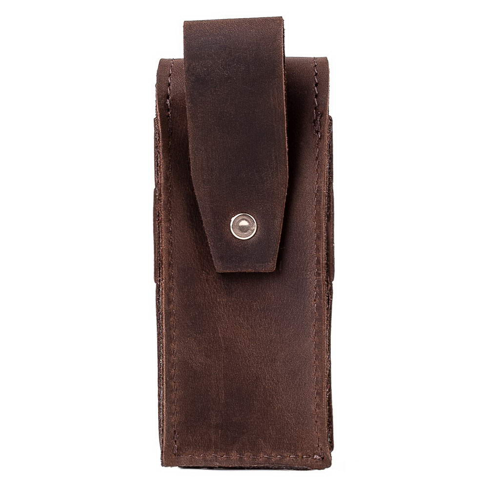 Back side of brown harmonica case showing belt attachment loop.