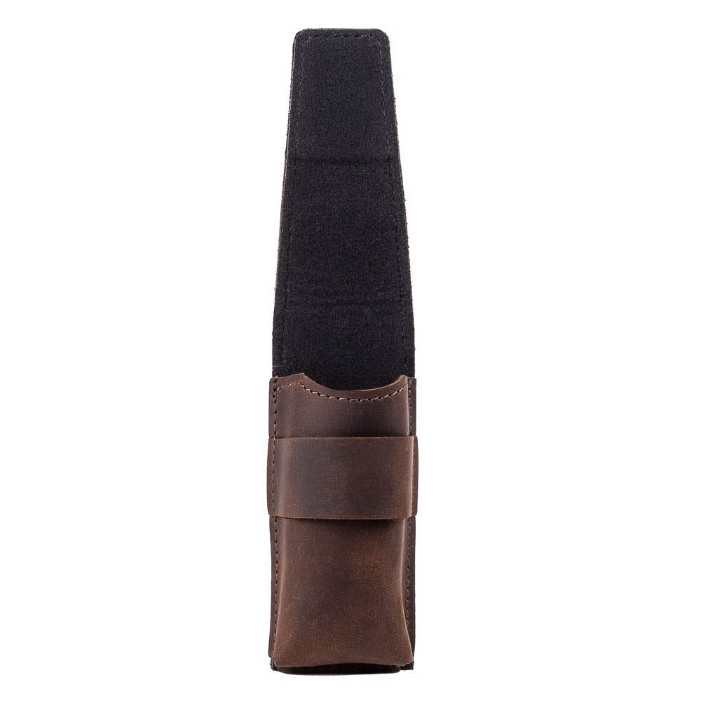 Side view of brown leather harmonica holder with flap open.