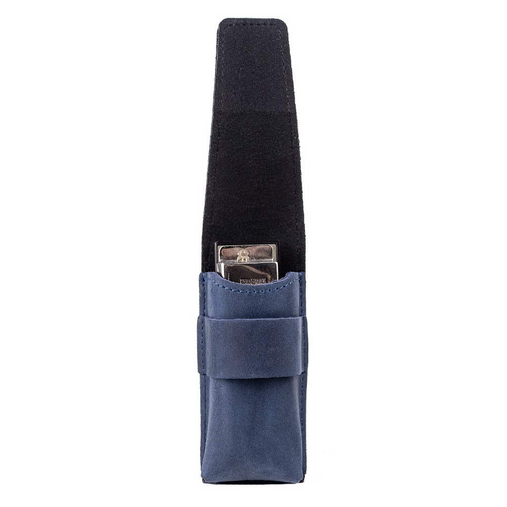 Dark blue leather harmonica case with harmonica inside, flap raised to show lining.