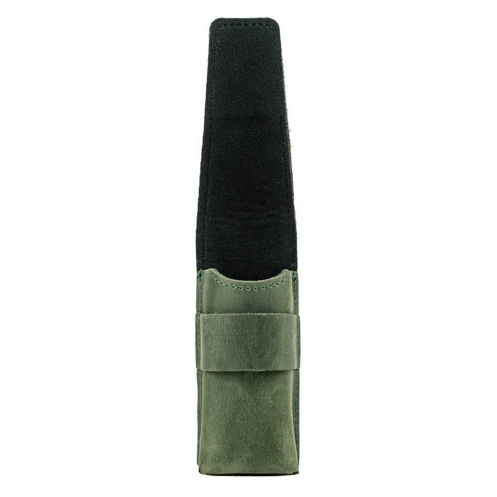 Side view of green harmonica holder with flap open showing suede inside.