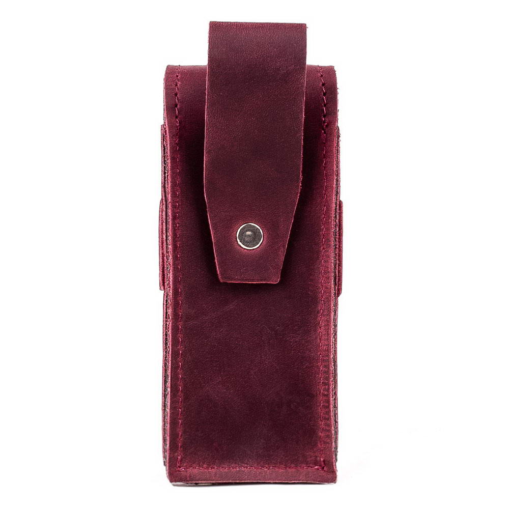 Back of marsala leather harmonica case featuring belt loop.