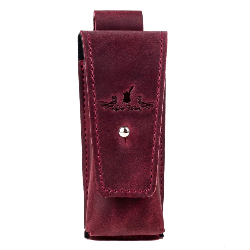 Front view of marsala leather harmonica case with snap closure and MG Leather Work logo embossing