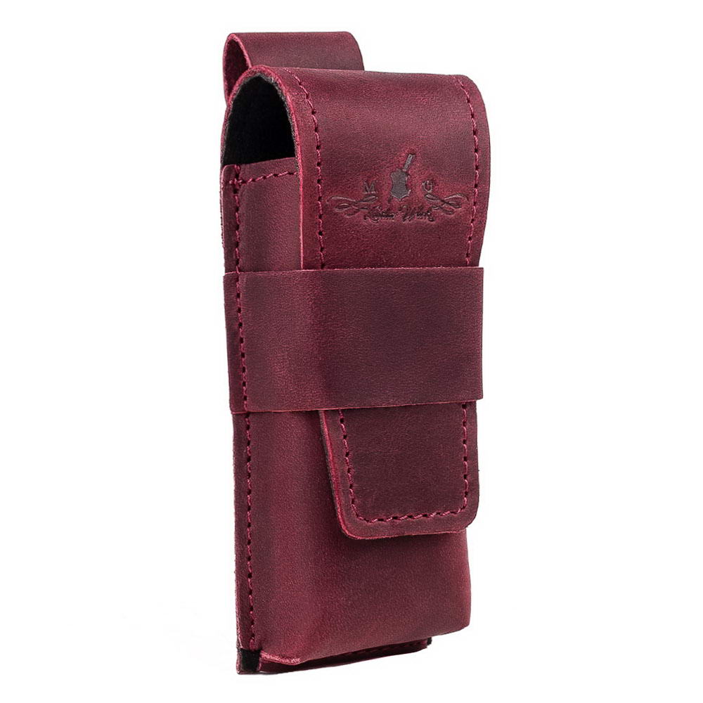 Angled shot of marsala harmonica leather holster with reinforced flap.