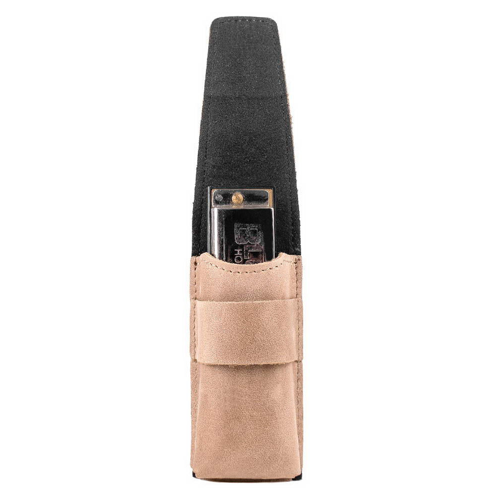 Olive leather harmonica case holding instrument, flap open to display inside.
