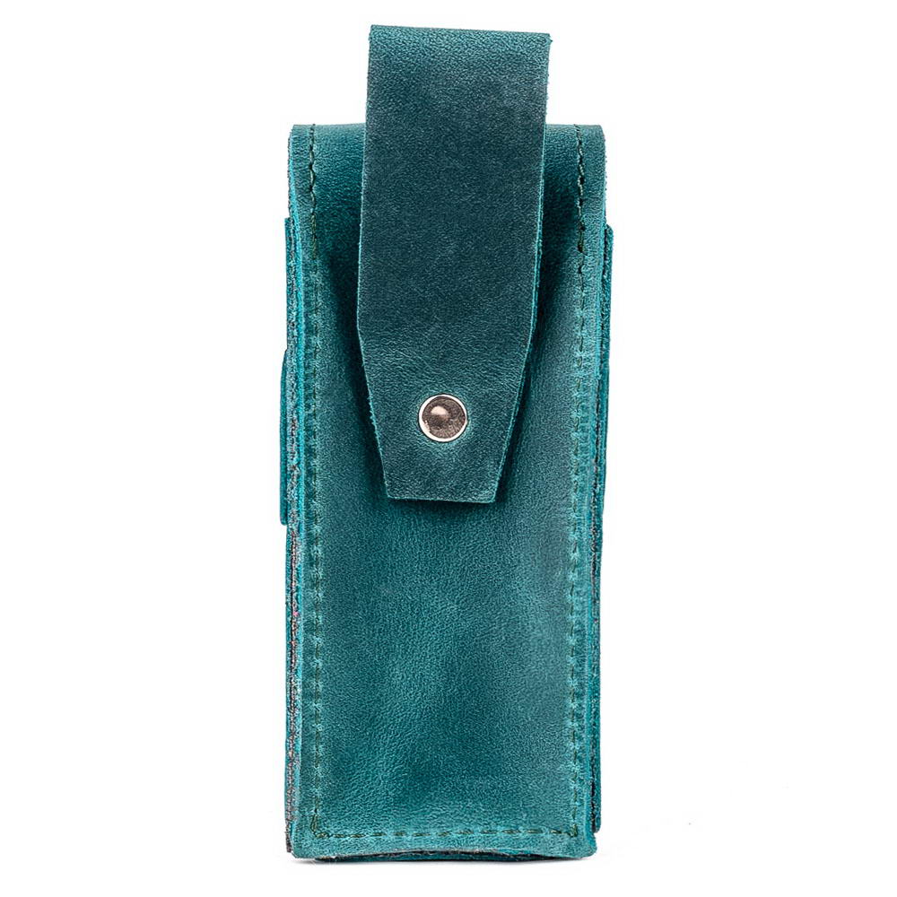 Back side of opal leather harmonica case with belt loop attachment.