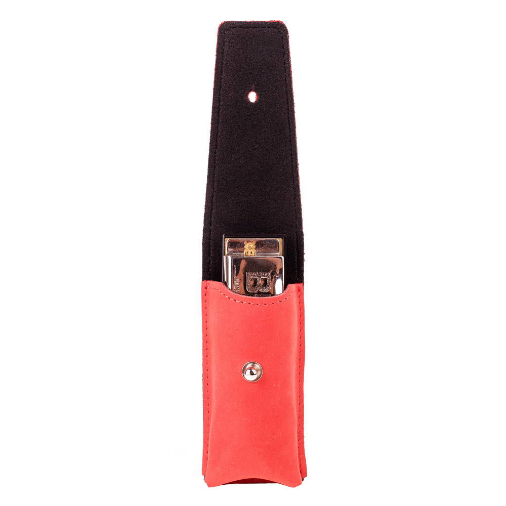 Red leather harmonica holster with harmonica inside, flap open to reveal interior