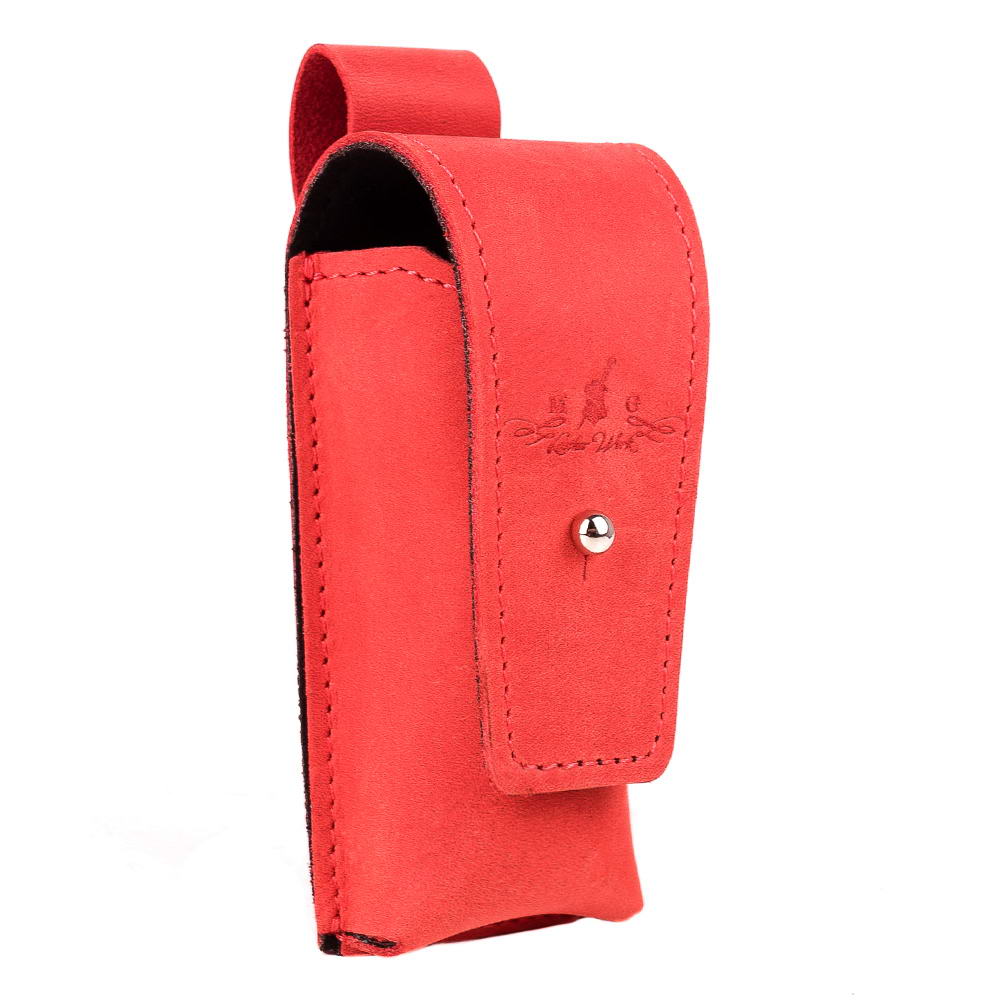 Angled front view of red harmonica leather holster with embossed MG Leather Work logo