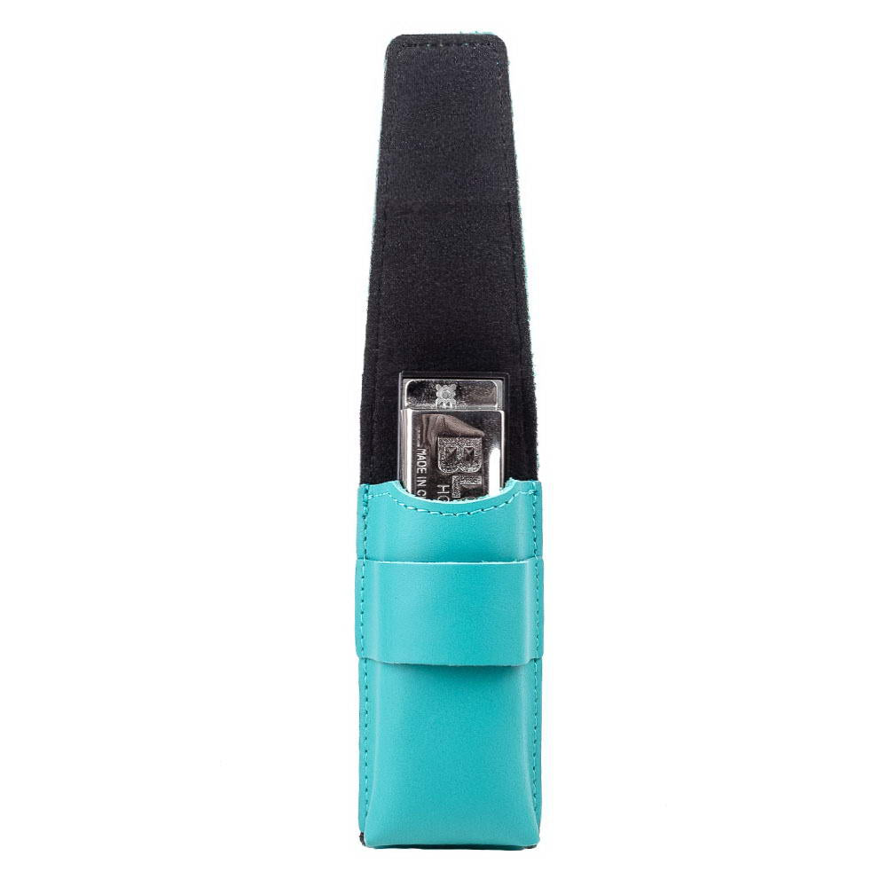 Tiffany blue leather harmonica case holding harmonica, flap lifted.