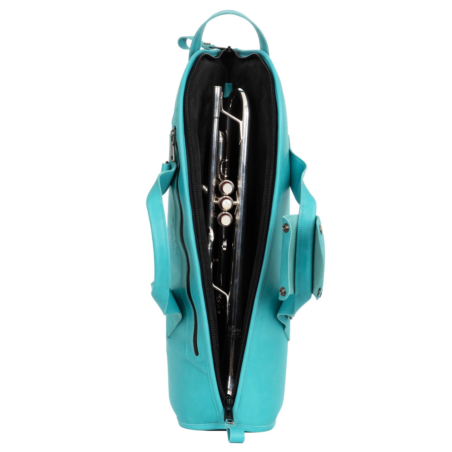 Open Tiffany trumpet casse showing a silver trumpet stored safely inside with padded interior and reinforced leather handles
