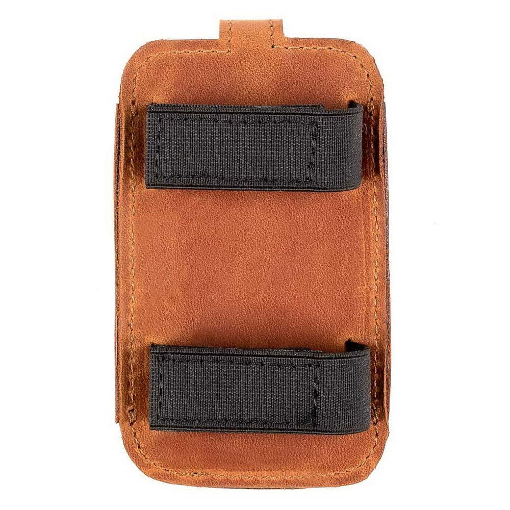 Back view of a leather microphone pouch with elastic straps for trumpet mounting.