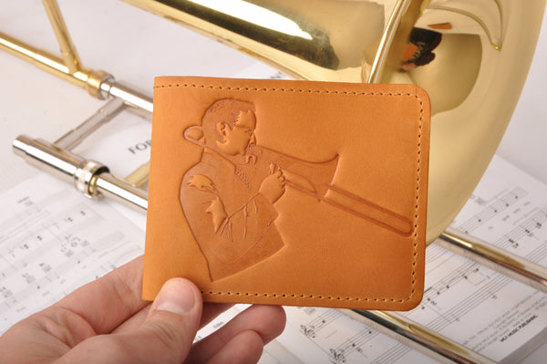 Wallet with a print of a musician playing on the trombone