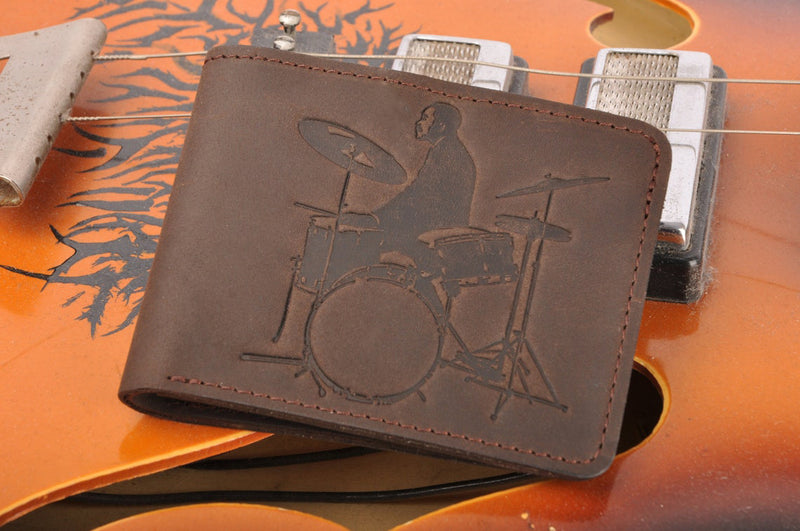 Wallet with a print of a musician playing on the drum